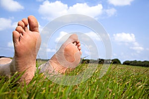 Relaxed foot on grass