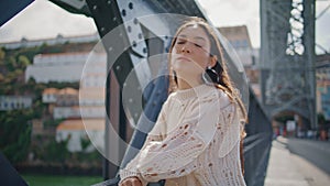 Relaxed girl posing vacation trip marine town view portrait. Sad woman resting