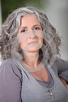 Relaxed gray-haired woman