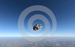 Relaxed and happy skydiver man on a summer day