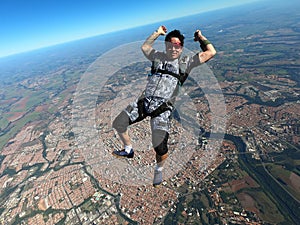 Relaxed and happy skydiver man on a summer day