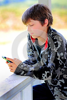 Relaxed Kid Texting