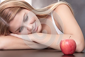 Relaxed looking an apple