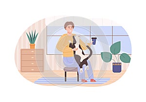 Relaxed man in sitting on chair hugging his cat