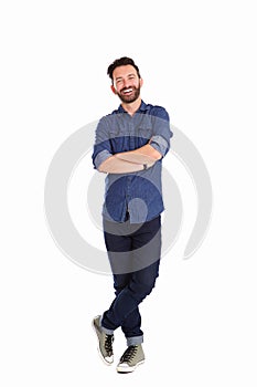 Relaxed mature man standing with arms crossed photo