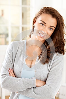 Relaxed and at peace with life. a beautiful young woman relaxing at home.