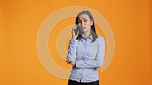 Relaxed person accepting calls in front of the lens