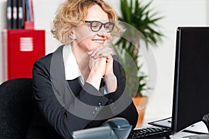 Relaxed portrait of beautiful aged corporate woman