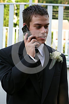 Relaxed Prom Boy On Phone Vertical