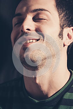 Relaxed and smiling man