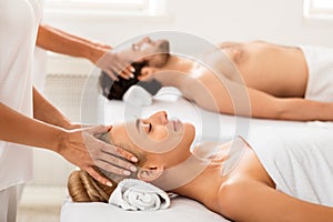Relaxed Spouses Getting Head Massage Together Relaxing Lying At Spa