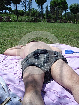Relaxed sunbathing man