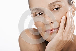 Relaxed Woman With Hand On Chin