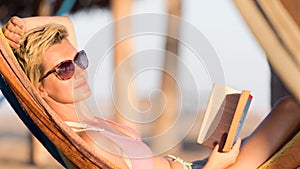 Relaxed woman laying in hammock