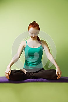 Relaxed woman in lotus pose