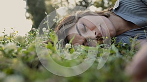 Relaxed woman resting on the grass