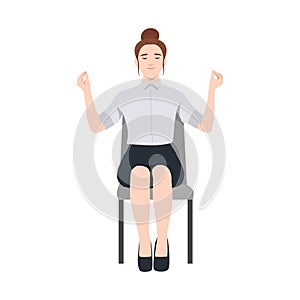 Relaxed woman sits on a chair in a meditative pose with eyes closed, practicing mindfulness photo