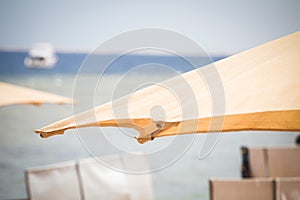 Relaxing Beach background with umbrellas and sea