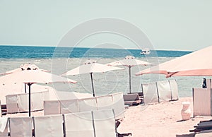 Relaxing Beach background with umbrellas and sea