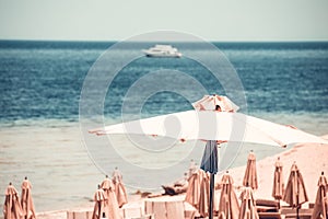 Relaxing Beach background with umbrellas and sea