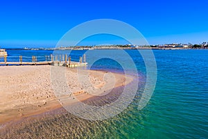 Relaxing at beach with pier at white beach - travel destination for vacation - Hurghada, Red Sea, Egypt