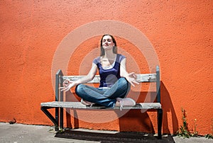 Relaxing beautiful female student breathing in between college exams photo