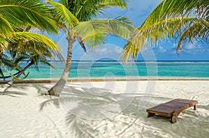 Relaxing on chair - Belize Cayes - Small tropical island at Barrier Reef with paradise beach - known for diving, snorkeling and