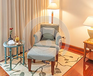 Relaxing corner, Reclining armchair, ottoman and table in hotel