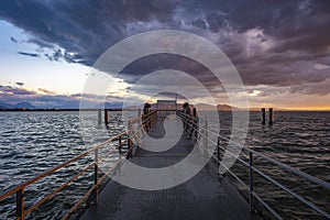 dramatic clouds with sunset at the Kaiserstrand in Lochau, Vorarlberg, Austria photo