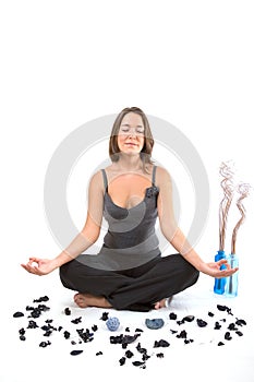 Relaxing girl in yoga position