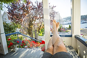 Relaxing man with bare feet in the nature