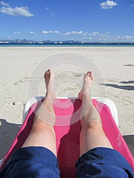 Relaxing Man Beach legs photo