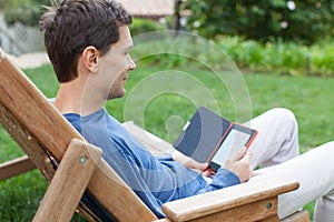 Relaxing man reading