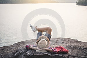 Relaxing moment Asian boy backpacker in nature