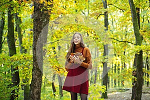 Relaxing in nature. Woman enjoy nature alone. Nature is source of power for her. Natural beauty. Autumnal melancholy