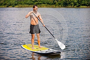 Relaxing on paddleboard. photo