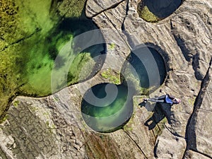 Relaxing poolside, at the seaside and coastal rock pools