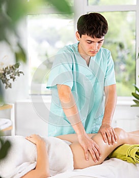 Relaxing professional massage for woman in spa salon