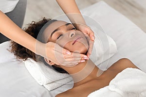Relaxing spa massage for african american lady