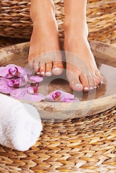 Relaxing spa treatment. Closeup of feet getting a spa treatment.