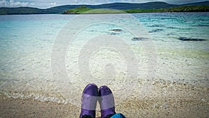 Relaxing on vacation at Coral Beach in Claigan on Isle of Skye in Scotland