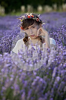 Relaxing woman in lavender field