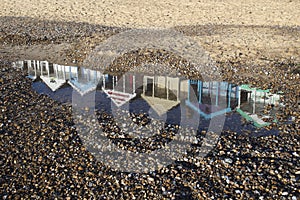 Relection of Beach Huts on Southwold Beach, Suffolk, England