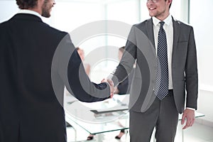 Reliable handshake of business partners in the office