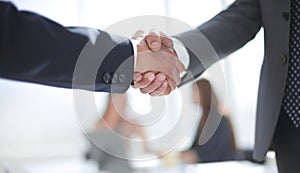 Reliable handshake of business partners in the office