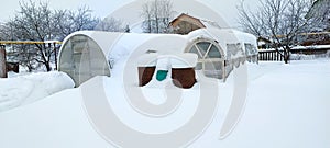 Reliable polycarbonate greenhouses at their summer cottage in winter