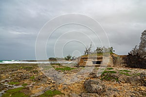 Relics of abandoned pillbox in Boca de Camarioca Cuba on the ocean beach