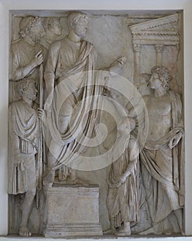 Relief from the Arch of Portugal - Hadrian\'s donation of food to Roman children photo