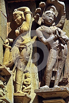 Relief carving of Apsara and Nayika or Nagadevata on the wall of Lakshmana Temple