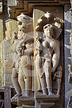 Relief carving of Apsara and Nayika or Nagadevata on the wall of Lakshmana Temple